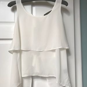 Sleeveless white blouse